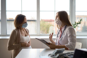 doctor talking to her patient